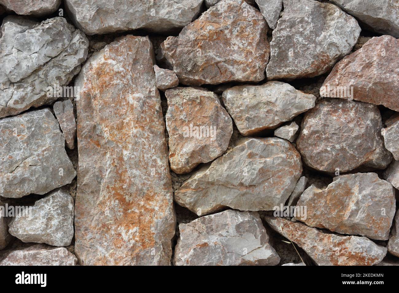 a wall made of stones – a surface texture Stock Photo