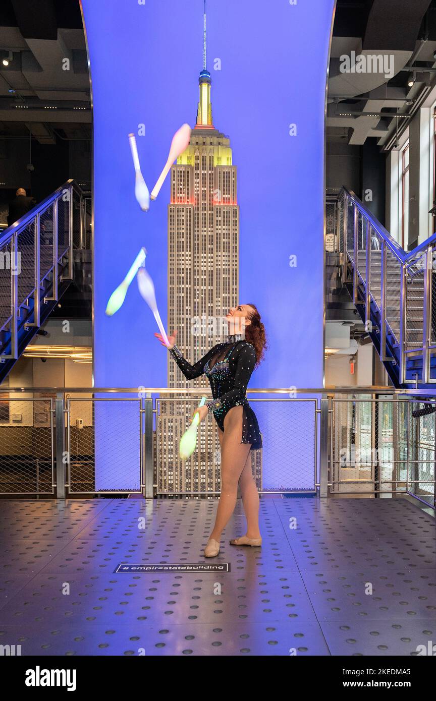Juggler Gina Cristiani of Big Apple Circus poses on grand staircase of