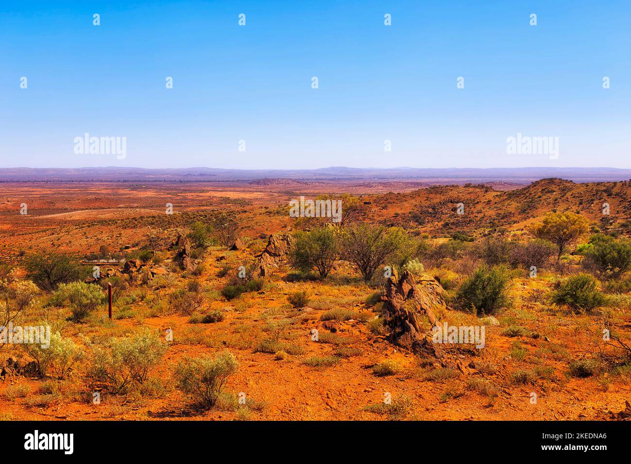Broken Hill living desert garden on hill tops overlooking scenic valley of red soil Australian outback. Stock Photo