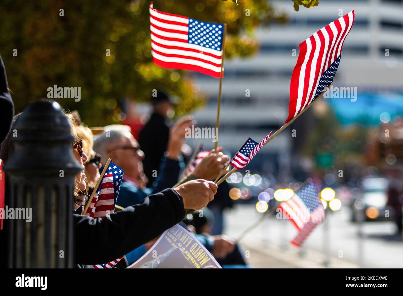 Reno, United States. 11th Nov, 2022. People wave American flags during