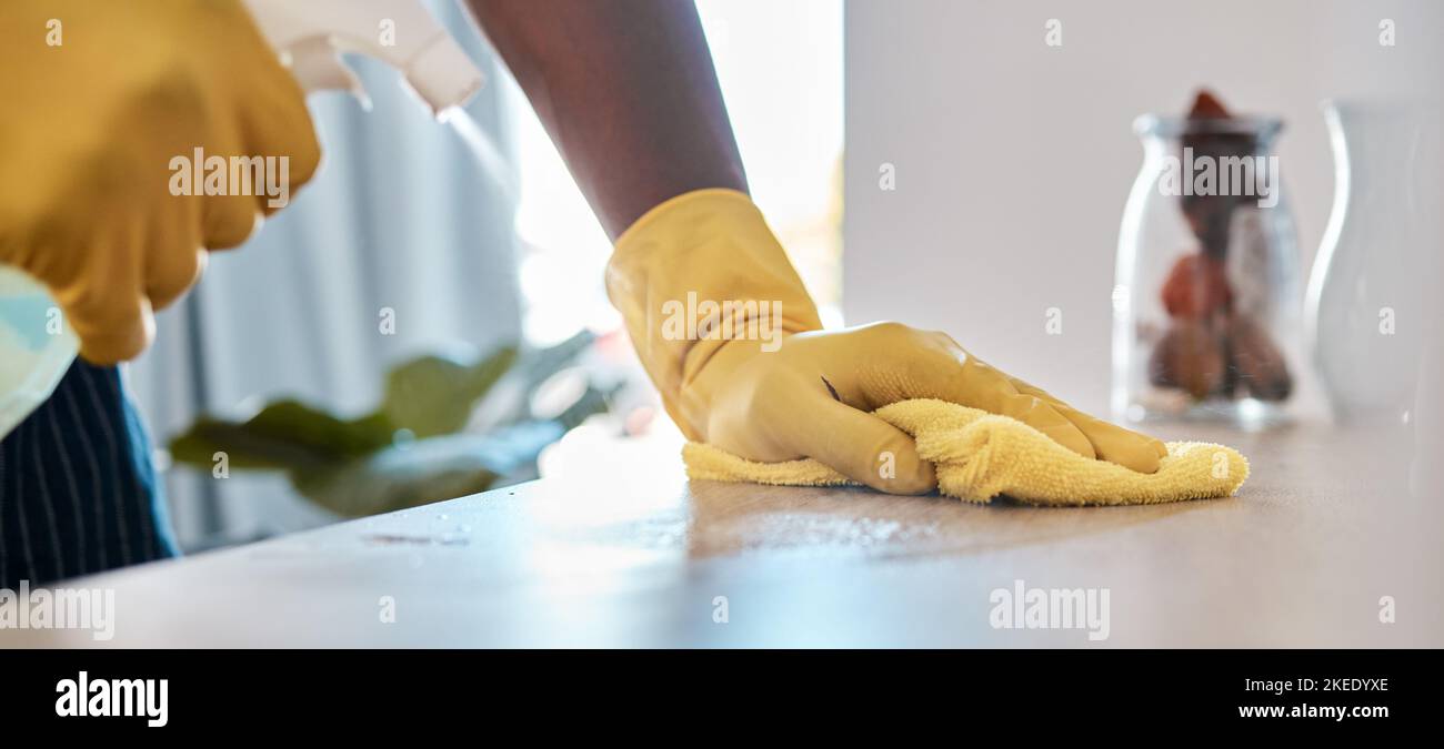 Table, spray bottle and black woman hands cleaning dust, furniture desk