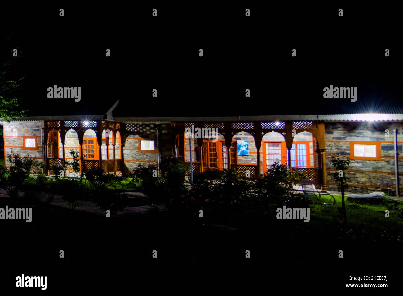old traditional style wooden house in night with beautiful colorful ...