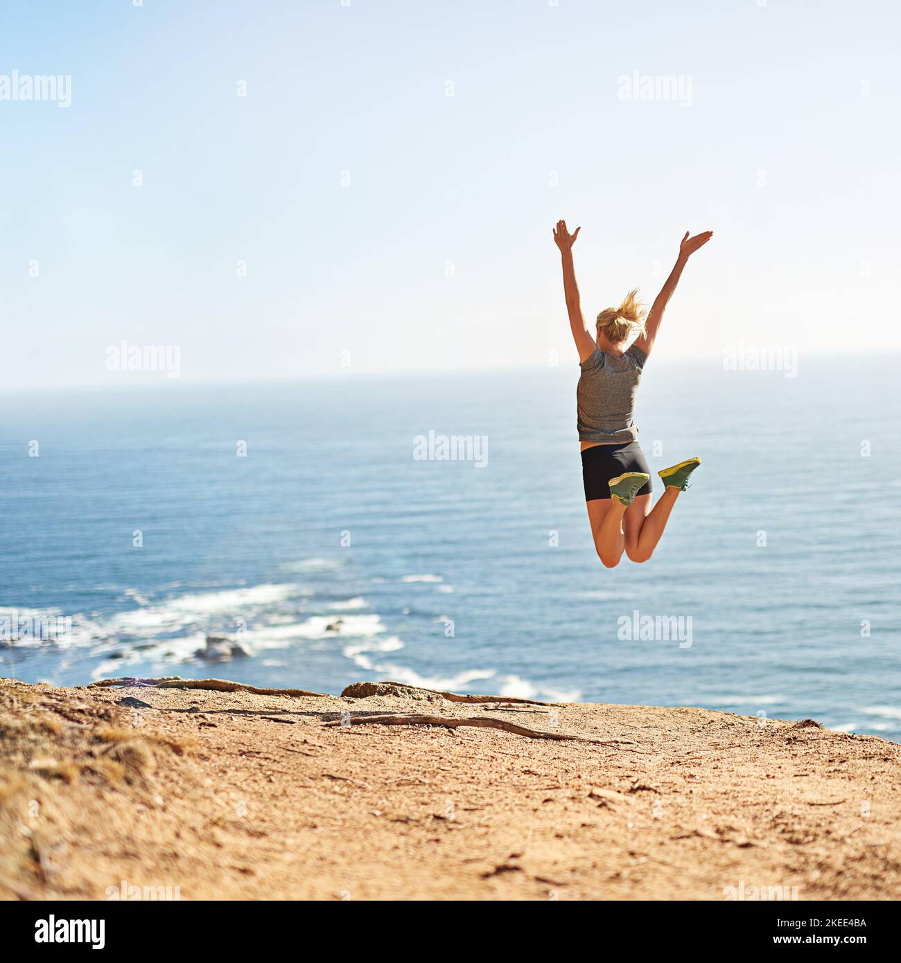 Pain is only temporary but victory is forever. a young woman jumping