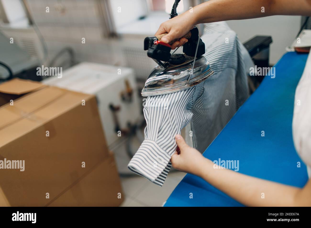 Dry cleaning clothes. Clean cloth chemical process. Laundry industrial