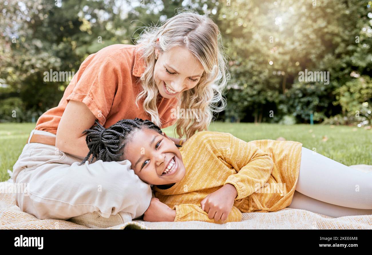 Relax, mother and adoption child picnic with park blanket for bonding