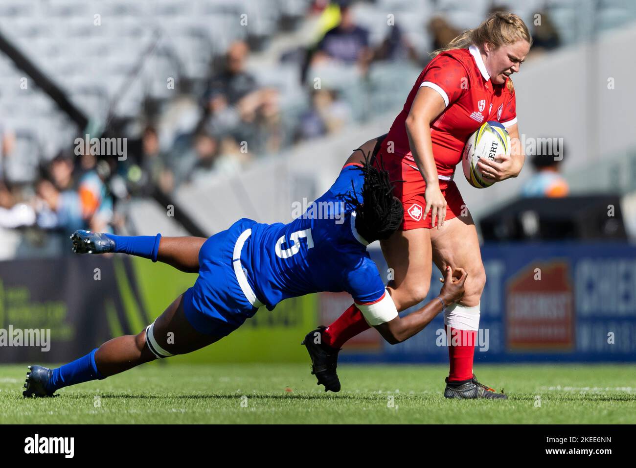 Canada's Olivia DeMerchant is tackled by France's Madoussou Fall during the Women's Rugby World Cup third place play-off match at Eden Park in Auckland, New Zealand. Picture date: Saturday November 12, 2022. Stock Photo
