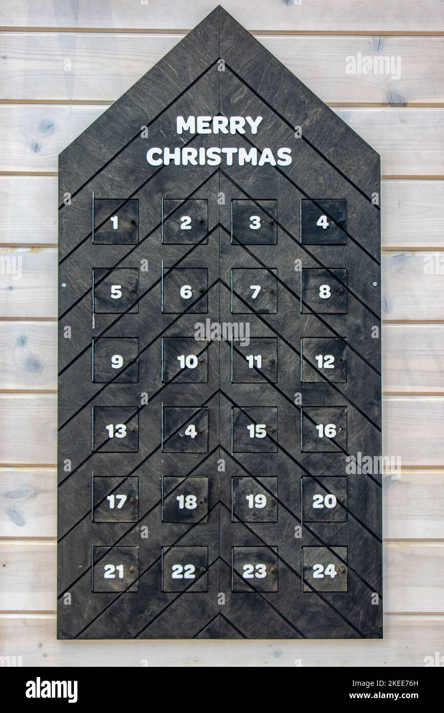 Decorative wooden advent calendar fixed on the wall Stock Photo Alamy