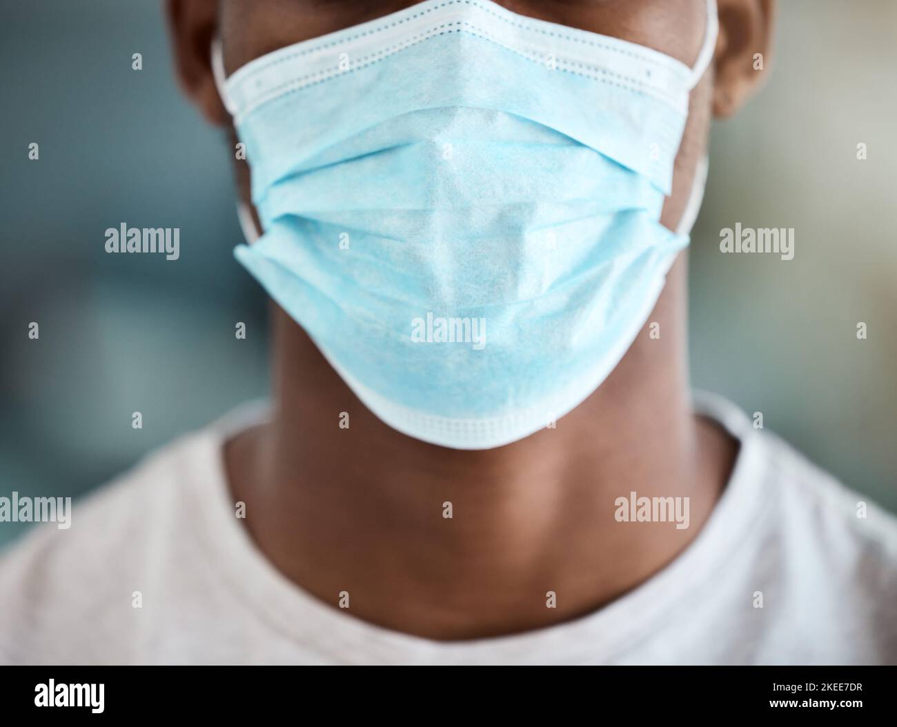 Face mask safety, covid 19 and closeup black man in wellness protection