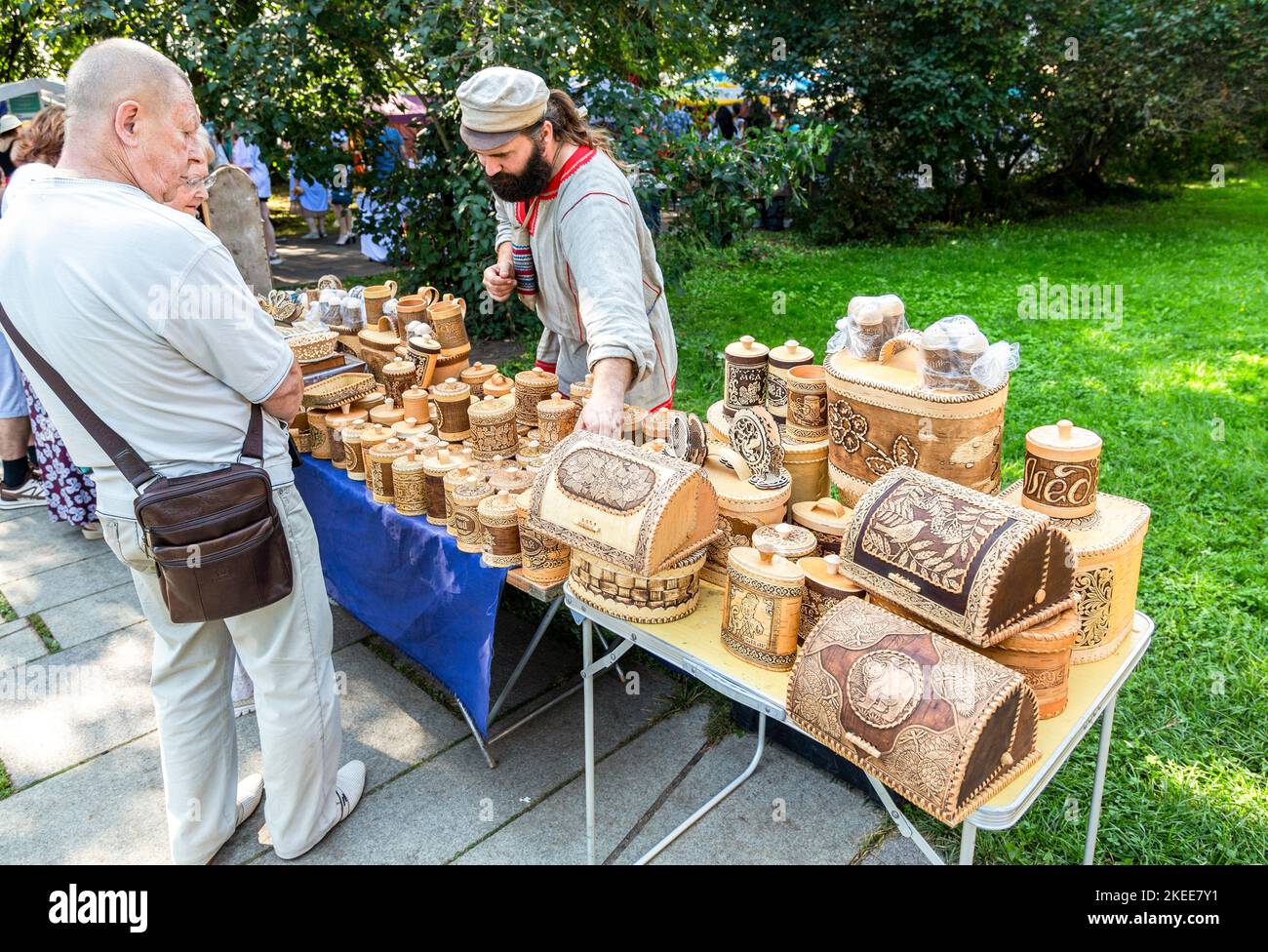 Velikiy Novgorod, Russia - August 27, 2022: Sale handmade products made of birch bark. Ecological dishes made of wood. Souvenirs Stock Photo