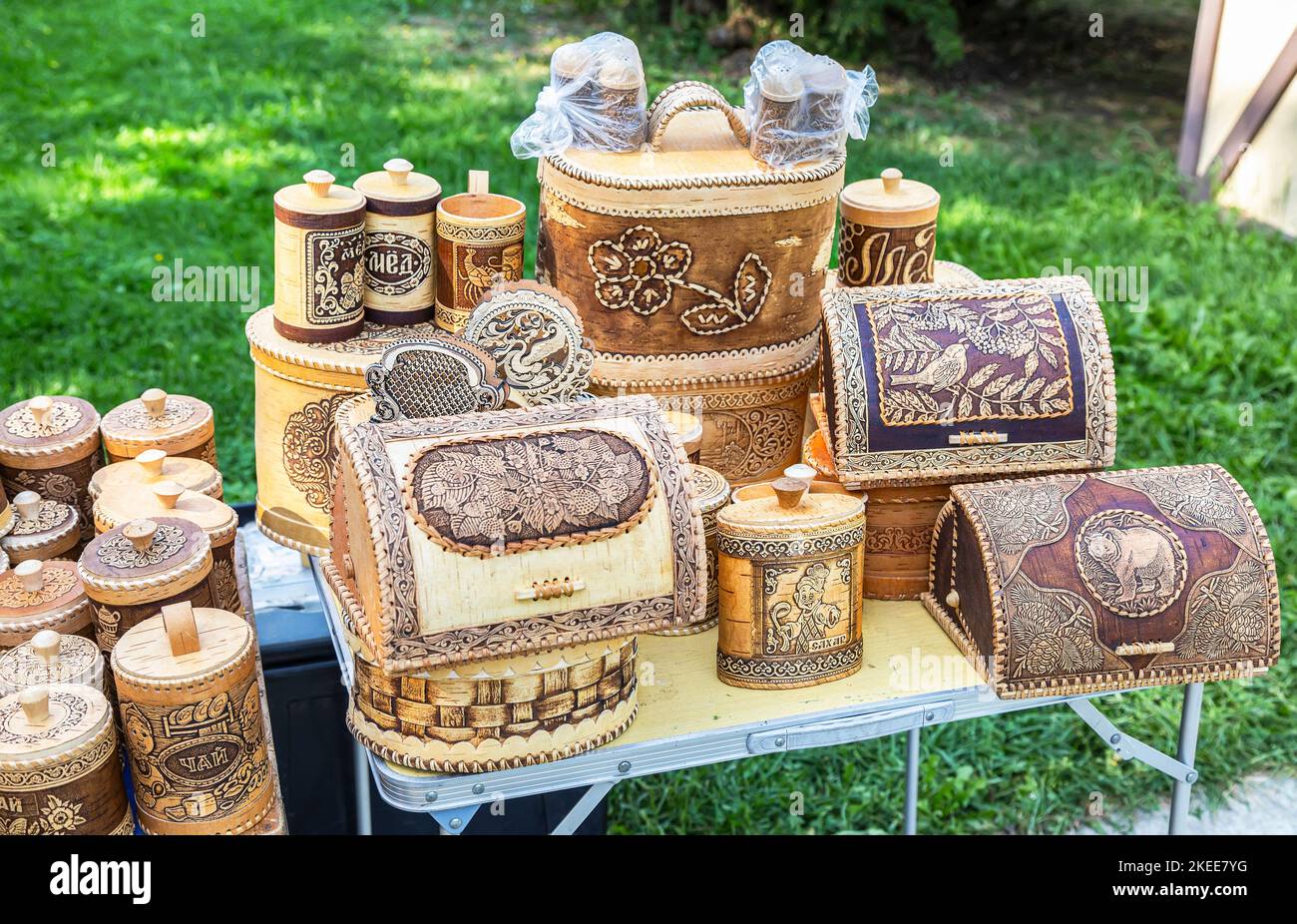 Velikiy Novgorod, Russia - August 27, 2022: Sale handmade products made of birch bark. Ecological dishes made of wood. Souvenirs Stock Photo