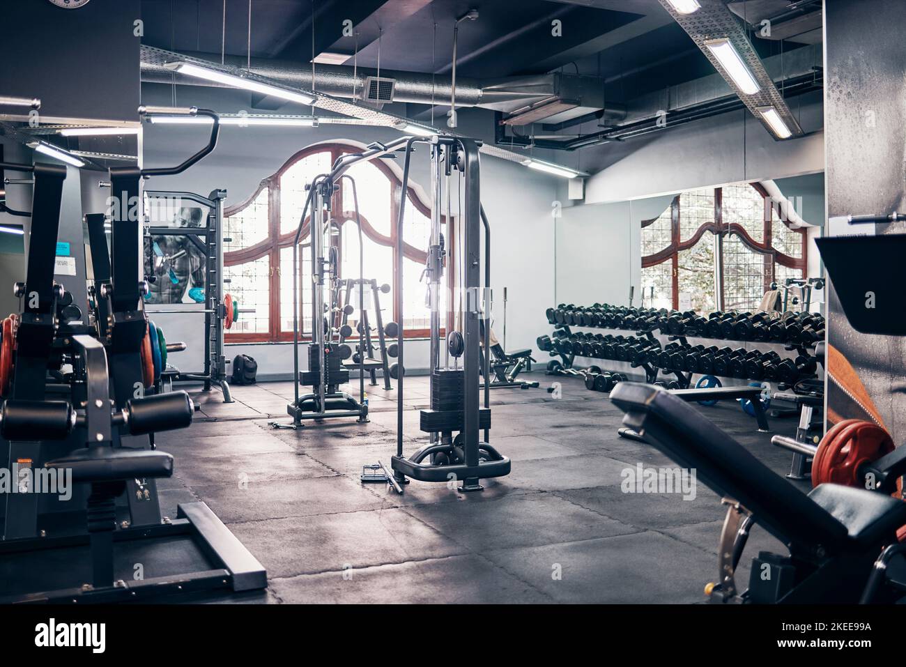 Empty gym, backgrounds and exercise building for sports, training and fitness, wellness and weightlifting. Health club interior space, recreation Stock Photo