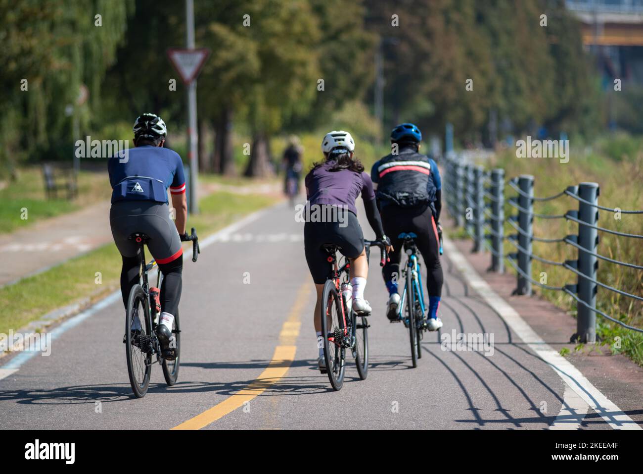 Cyclists on Hangang Han river bicycle path in Seoul South Korea on 16 October 2022 Stock Photo