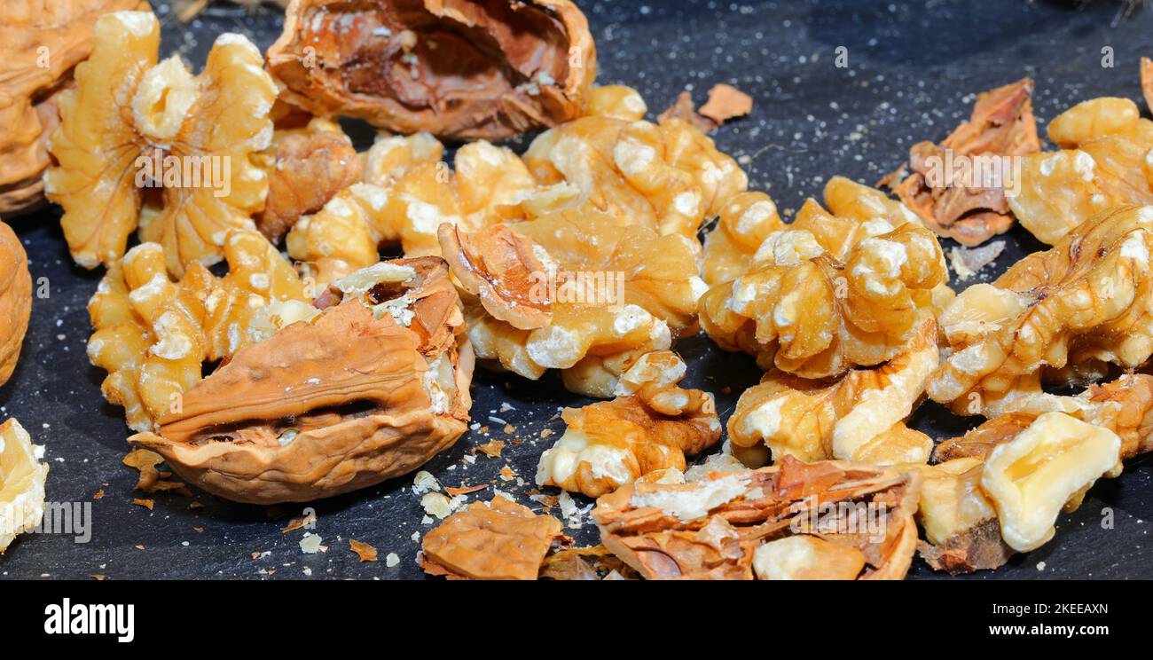 broken shells of walnuts with the edible kernel inside Stock Photo - Alamy