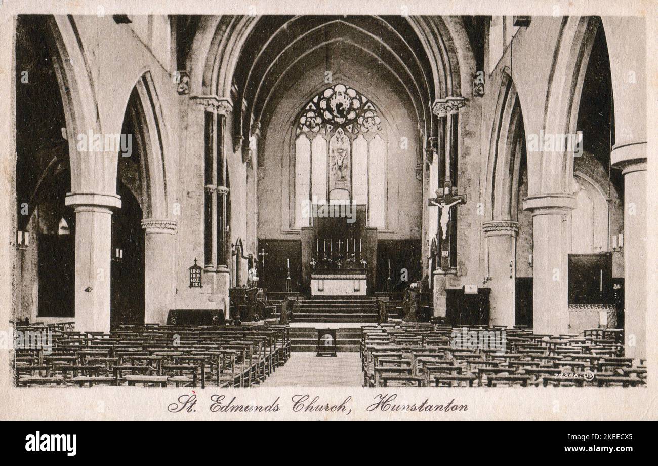 Interior of St Edmund's Church, Hunstanton, Norfolk looking east, from a postcard dated 1928. The church was designed by Frederick Preedy and building works commenced in 1865. The original design called for a north west tower, but this was never built due to lack of funds. Stock Photo