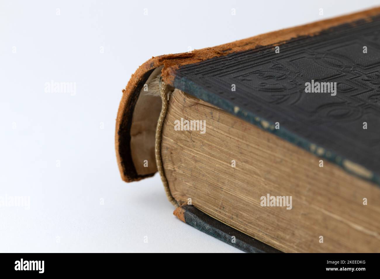 A closeup shot of an old antique book with a broken spine Stock Photo