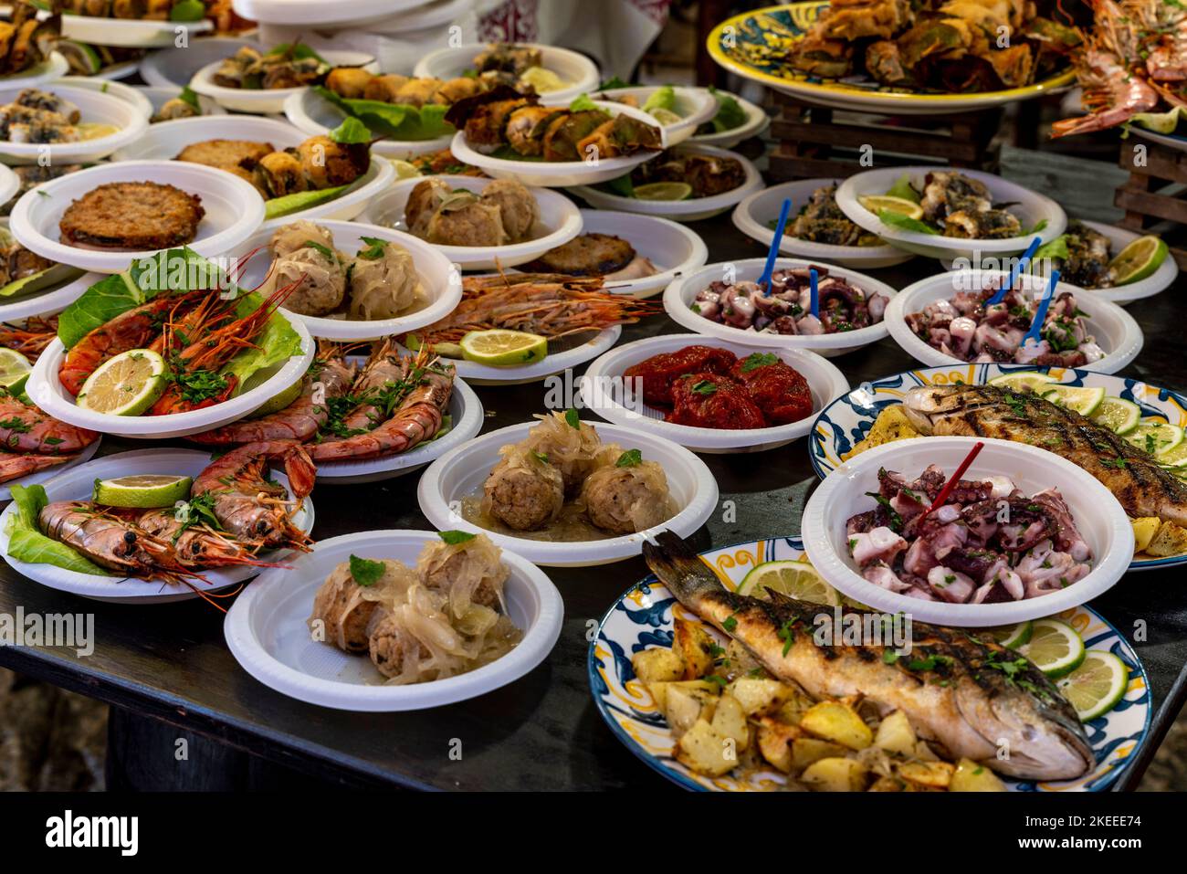 Various Fish and Seafood Dishes For Sale At The Capo Market (Mercado del Capo), Palermo, Sicily, Italy. Stock Photo