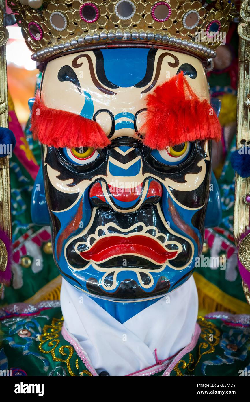 Painted head of a life-size puppet of a king, used in ritual processions at the decennial Da Jiu festival, Kam Tin, New Territories, Hong Kong, 2015 Stock Photo