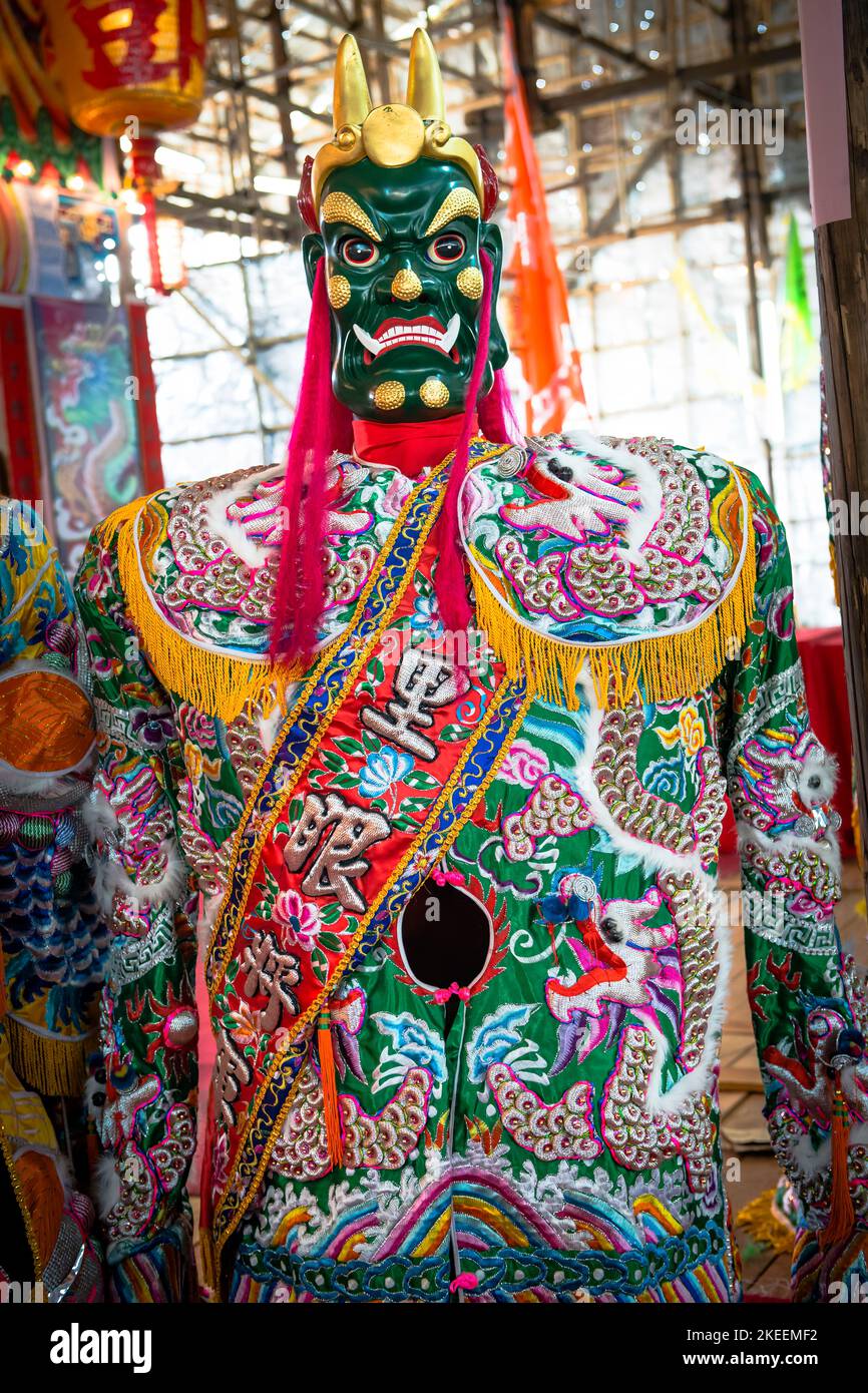 Elaborate, colourful life-size puppet of a demon, used in processions at the decennial Da Jiu festival, Kam Tin, New Territories, Hong Kong, 2015 Stock Photo