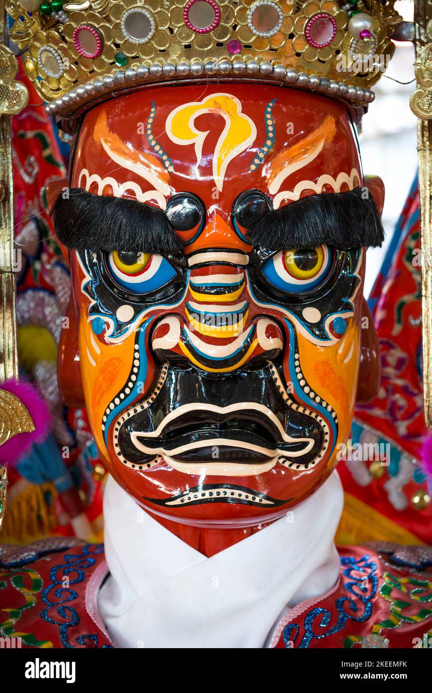 Painted head of a life-size puppet of a king, used in ritual processions at the decennial Da Jiu festival, Kam Tin, New Territories, Hong Kong, 2015 Stock Photo