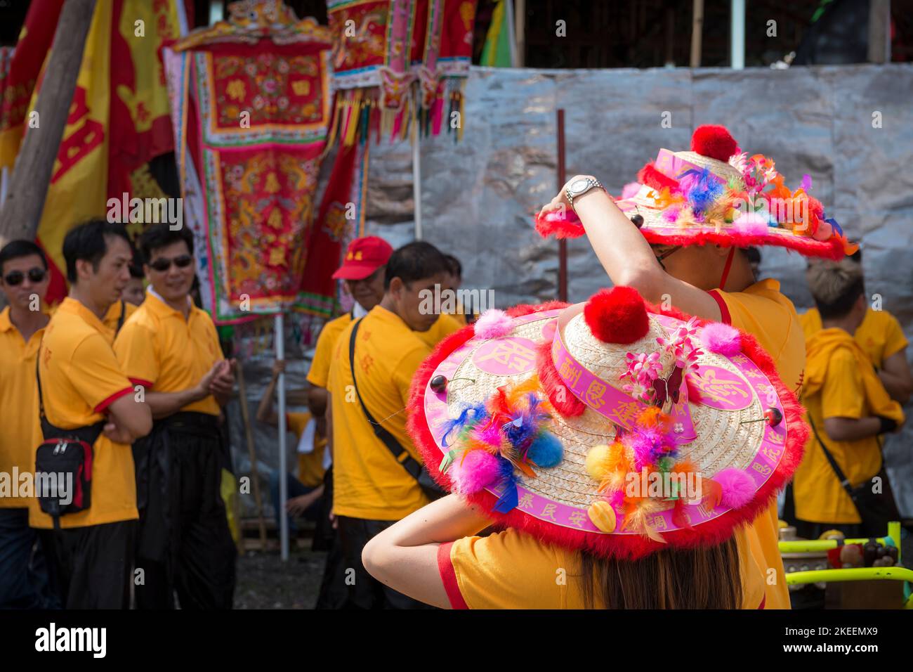 Villagers wear traditional decorated hats at the decennial Da Jiu festival site, Kam Tin, New Territories, Hong Kong, 2015 Stock Photo