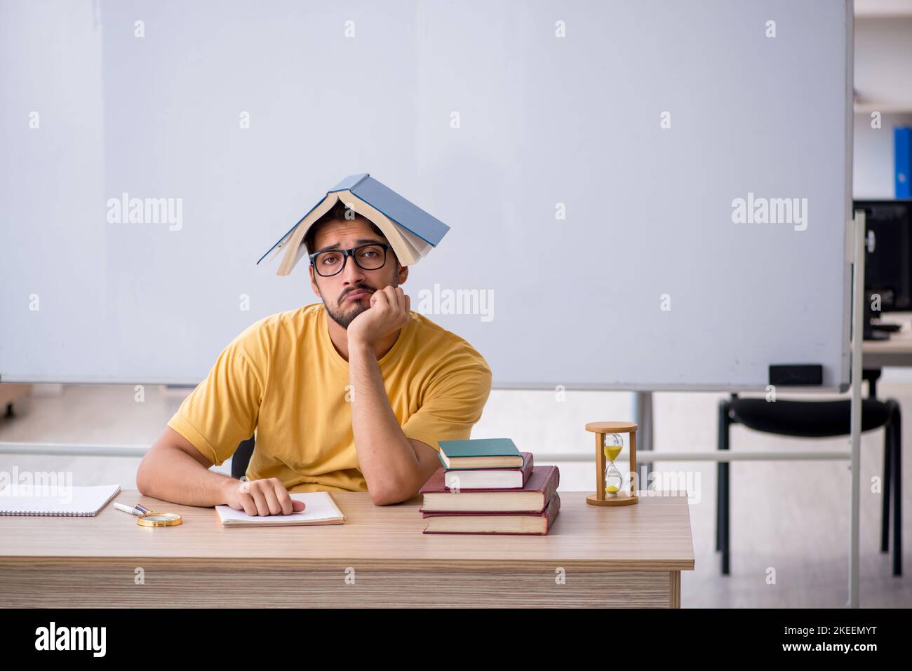 Getting Ready For Testing Young student preparing for exams in the classroom Stock Photo - Alamy
