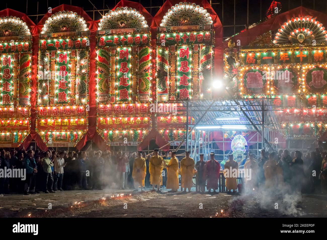 Taoist priests bless the ritual burned offerings at the climactic ...