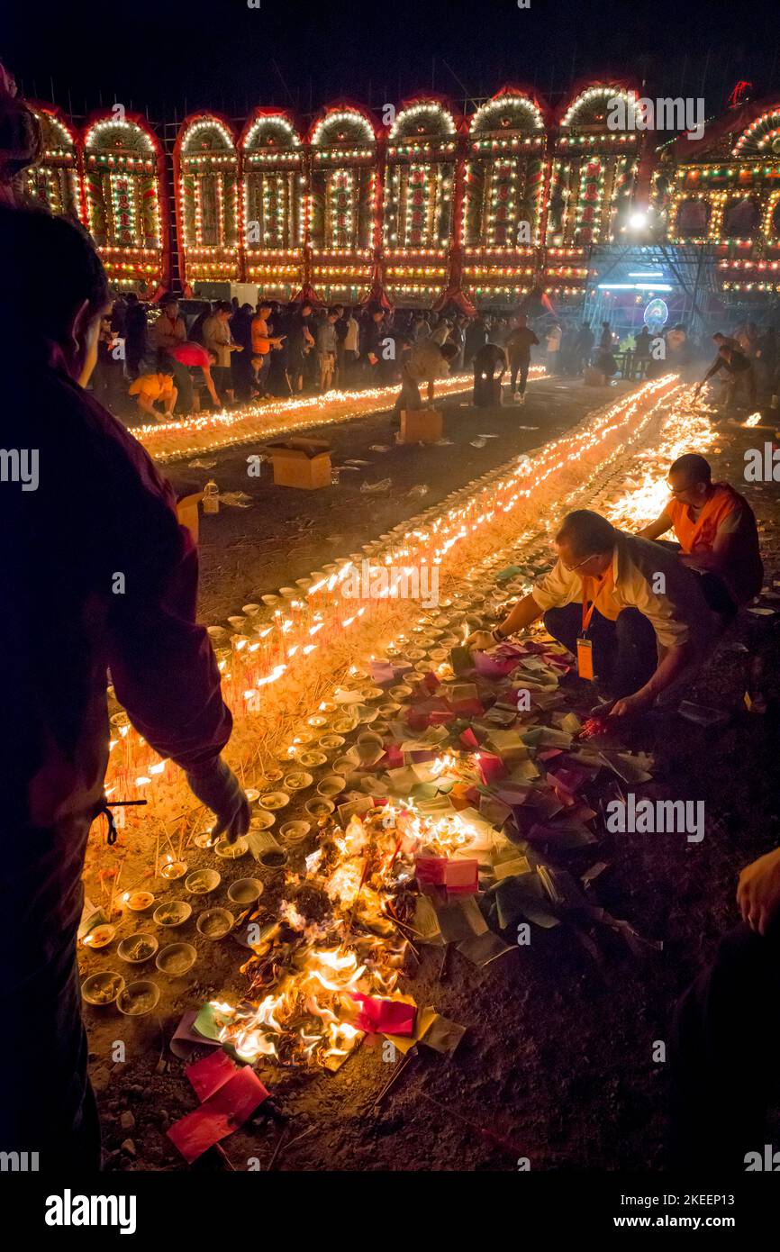 Villagers burn joss paper at night at the climactic ceremony of the decennial Da Jiu festival, Kam Tin, New Territories, Hong Kong, 2015 Stock Photo