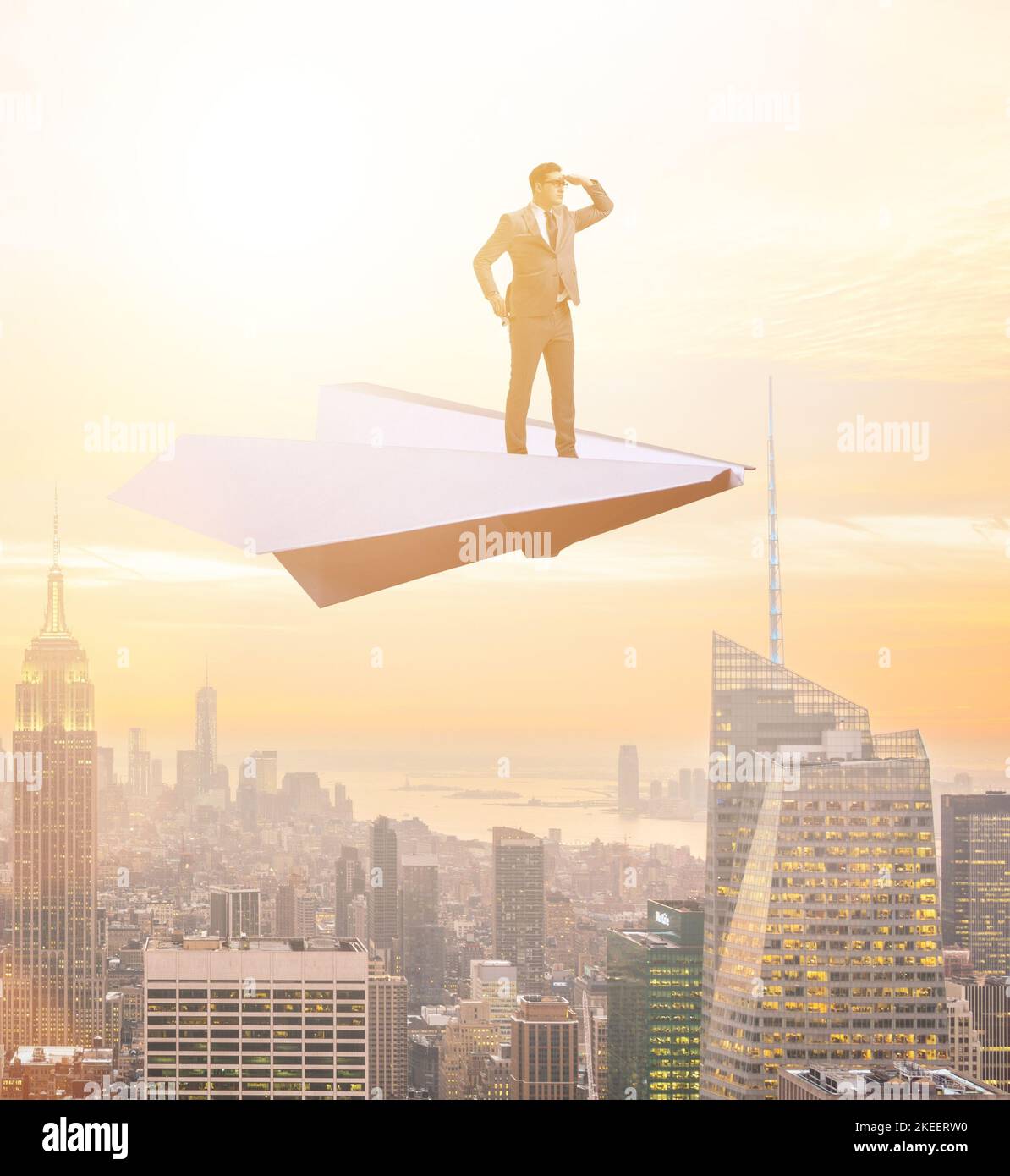 The businessman flying on paper plane in business concept Stock Photo ...
