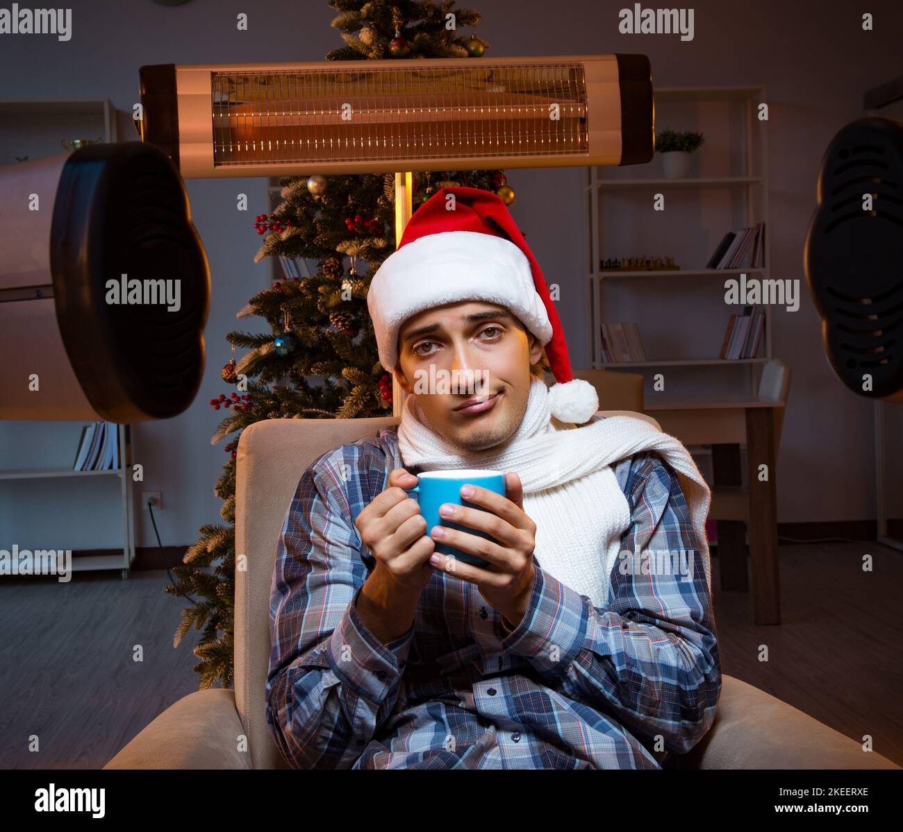 The man suffering from cold at home Stock Photo - Alamy