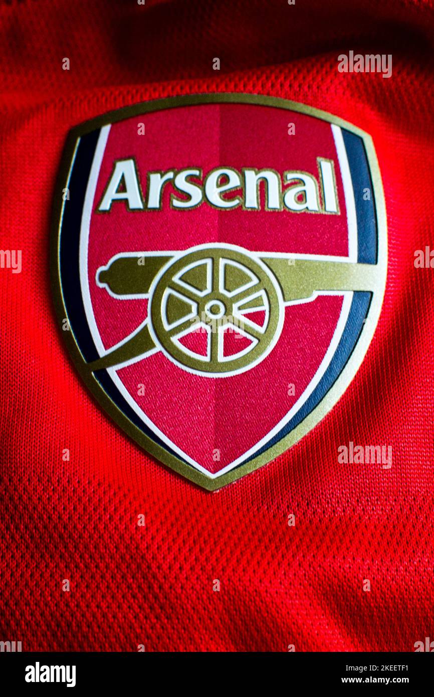 English Arsenal team logo sewn on a red jersey. Famous team of the British league founded by David Danskin, it is one of the strongest and most succes Stock Photo