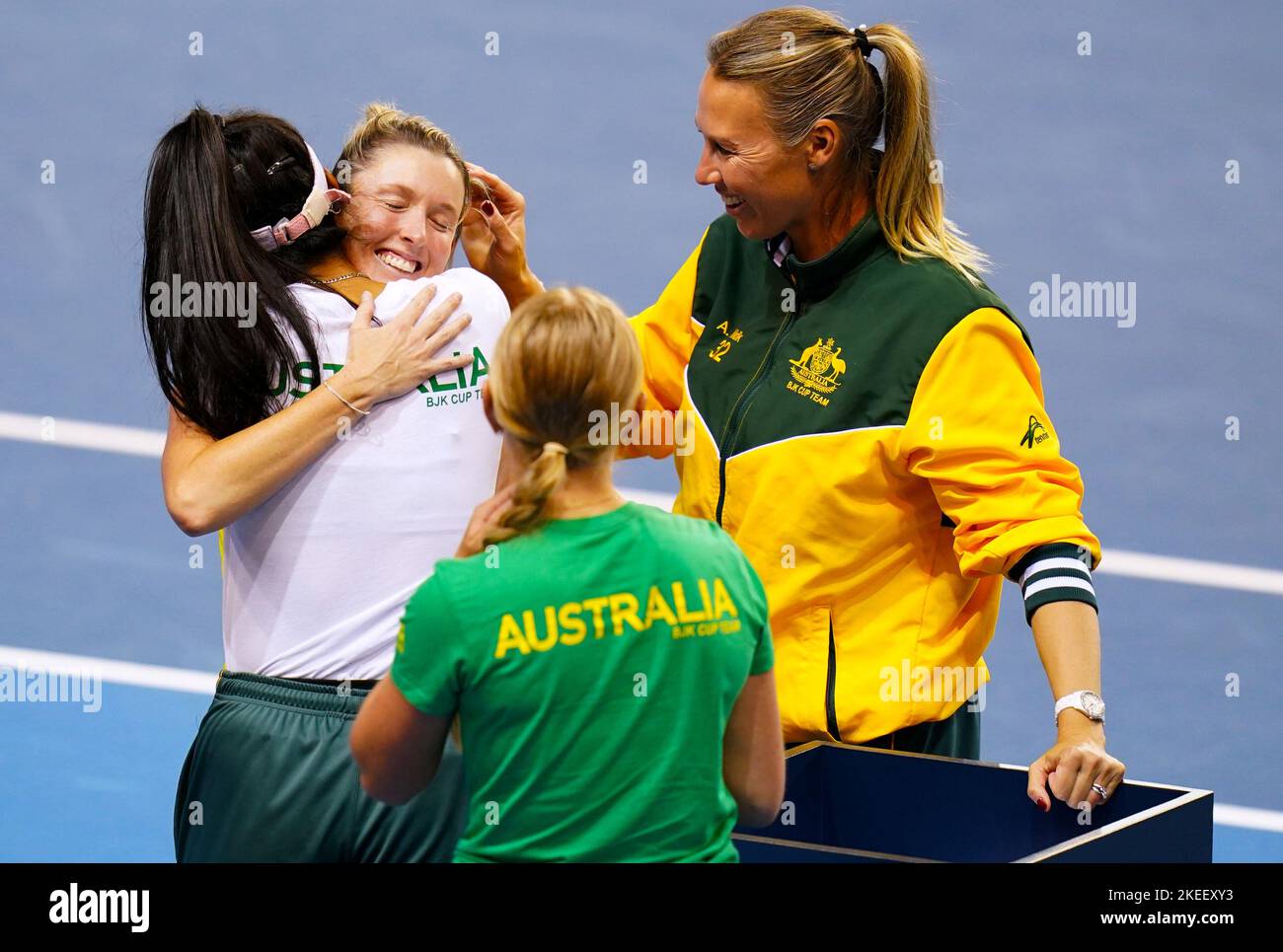 Australia's Storm Sanders celebrates with members of her team after