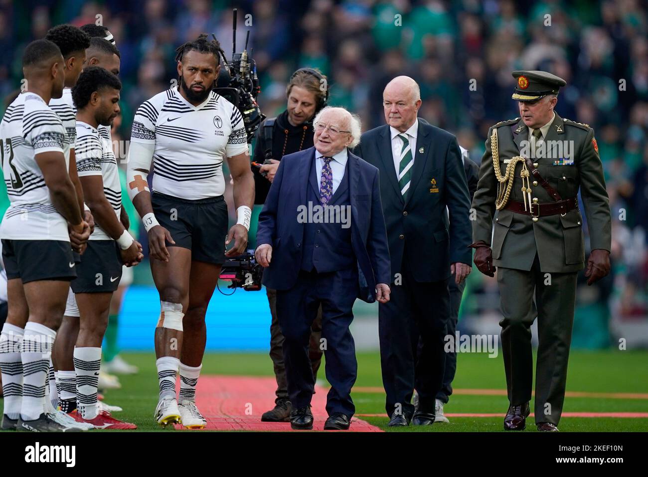 President of Ireland Michael D. Higgins (centre) is introduced to member of the Fiji team by Jiuta Wainiqolo (centre left) before the Autumn International match at the Aviva Stadium in Dublin, Ireland. Picture date: Saturday November 12, 2022. Stock Photo