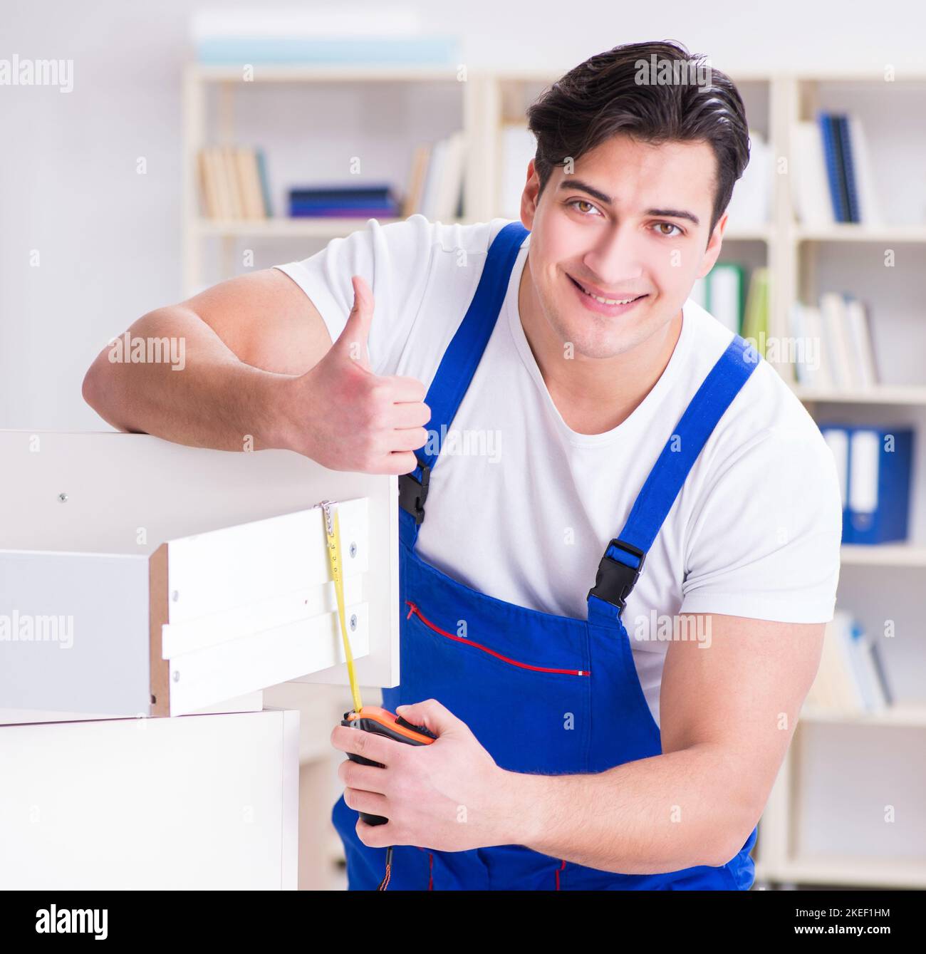 The furniture repair and assembly concept Stock Photo Alamy