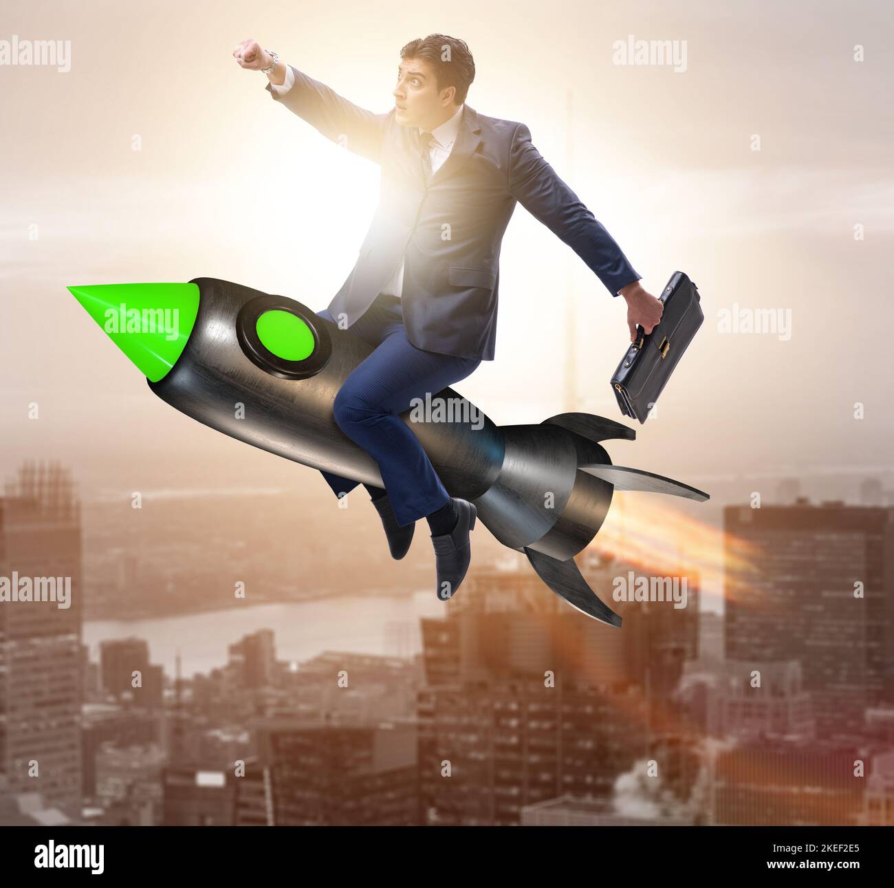 The male businessman flying on rocket in business concept Stock Photo ...