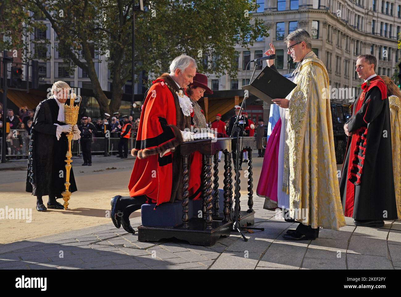 The new Lord Mayor of London Nicholas Lyons, with his wife Felicity, receive a blessing from Dean of St Paul's, The Very Revd Andrew Tremlett during the Lord Mayor's Show in the City of London. Picture date: Saturday November 12, 2022. Stock Photo