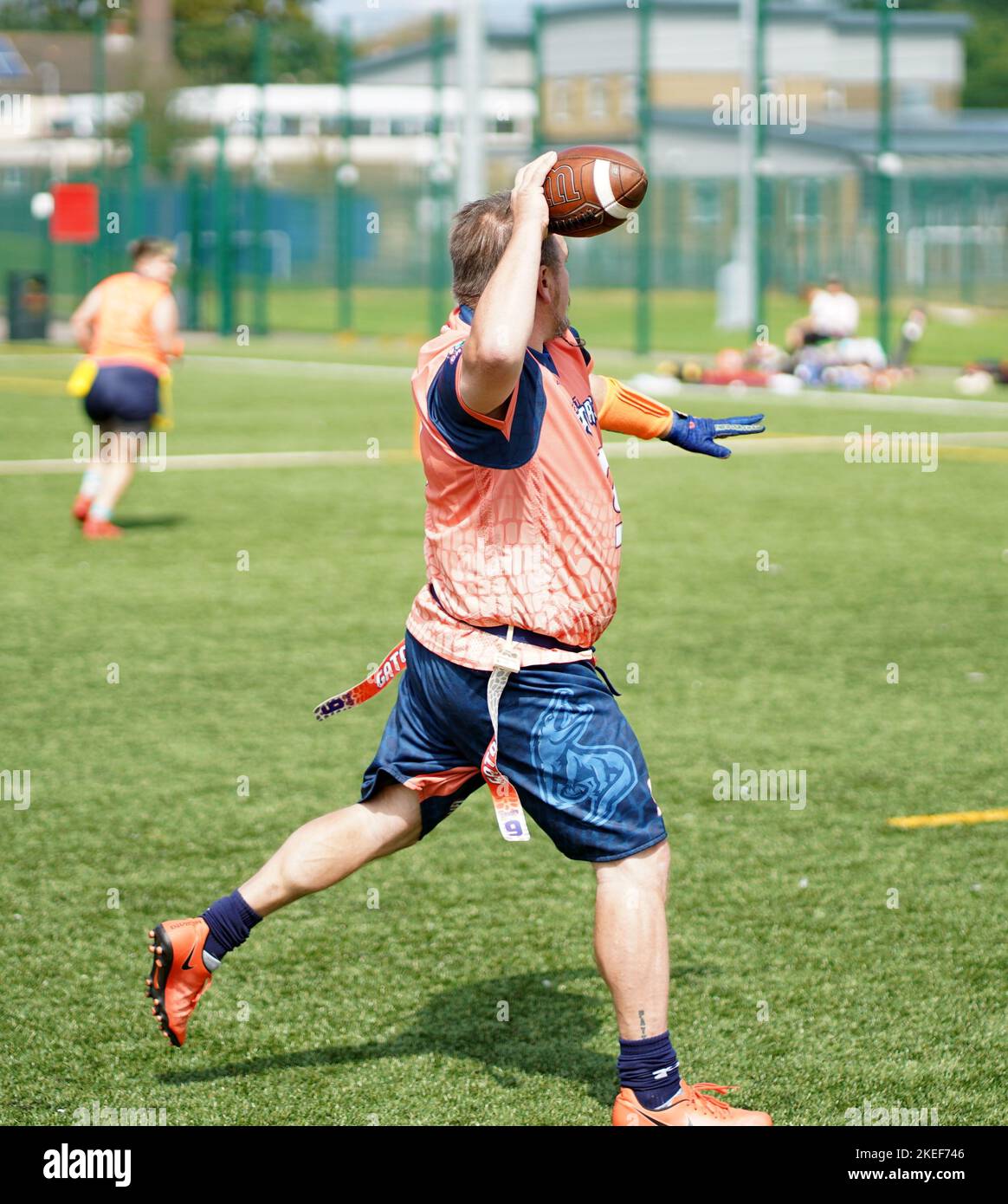 Flag football quarterbacks throwing the ball Stock Photo
