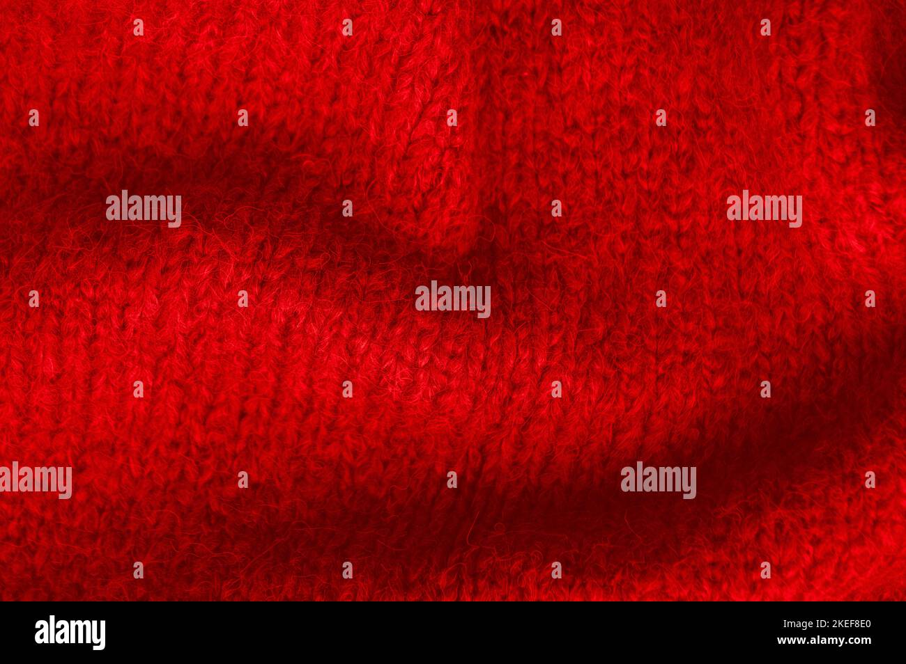 Organic knitting background with detail wool threads. Stock Photo