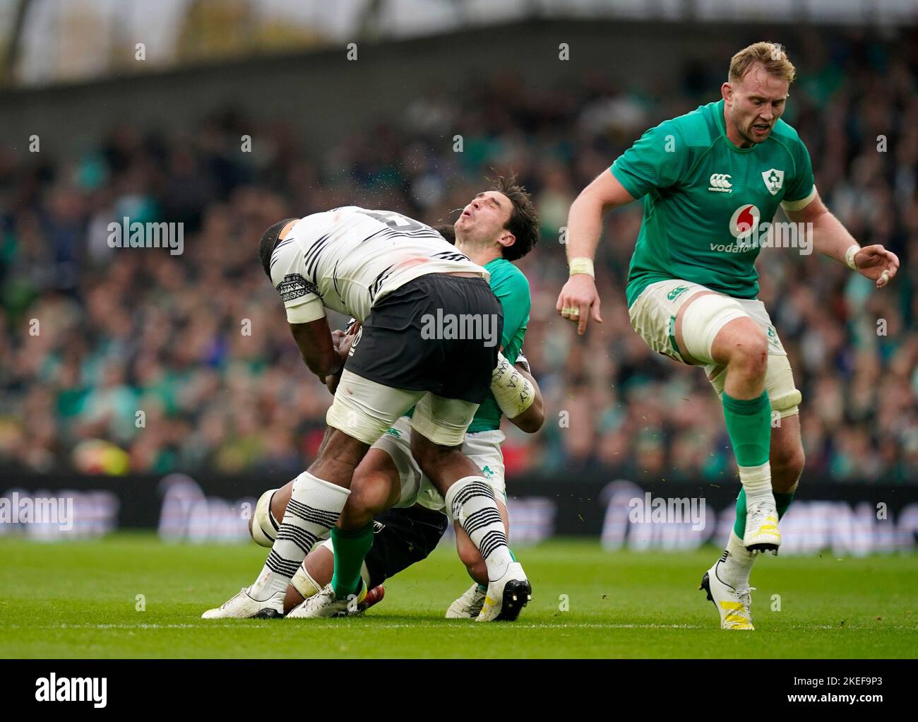 Ireland's Joey Carbery is tackled by Fiji's Albert Tuisue during the Autumn International match at the Aviva Stadium in Dublin, Ireland. Picture date: Saturday November 12, 2022. Stock Photo