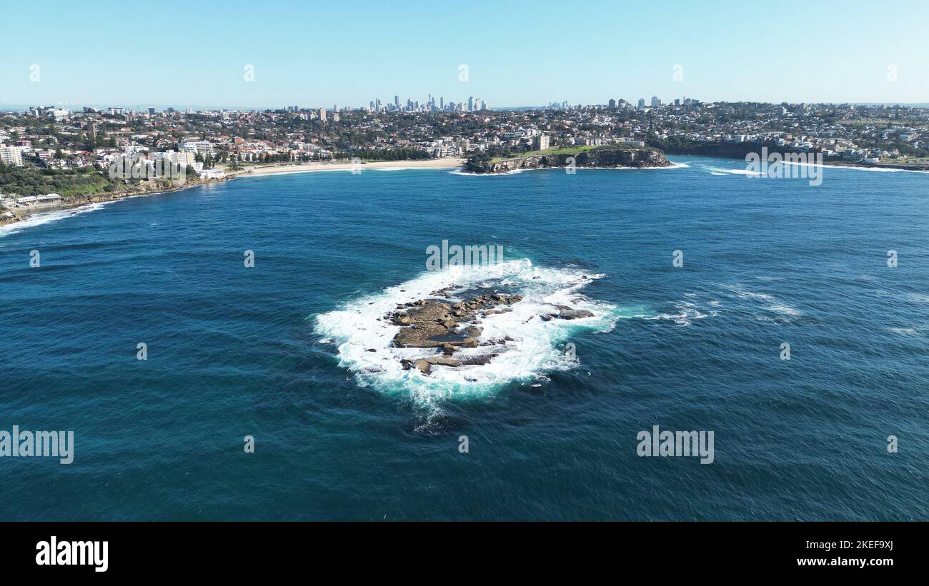 A beautiful aerial view of waves crashing against Wedding Cake Island In Coogee Australia. Stock Photo