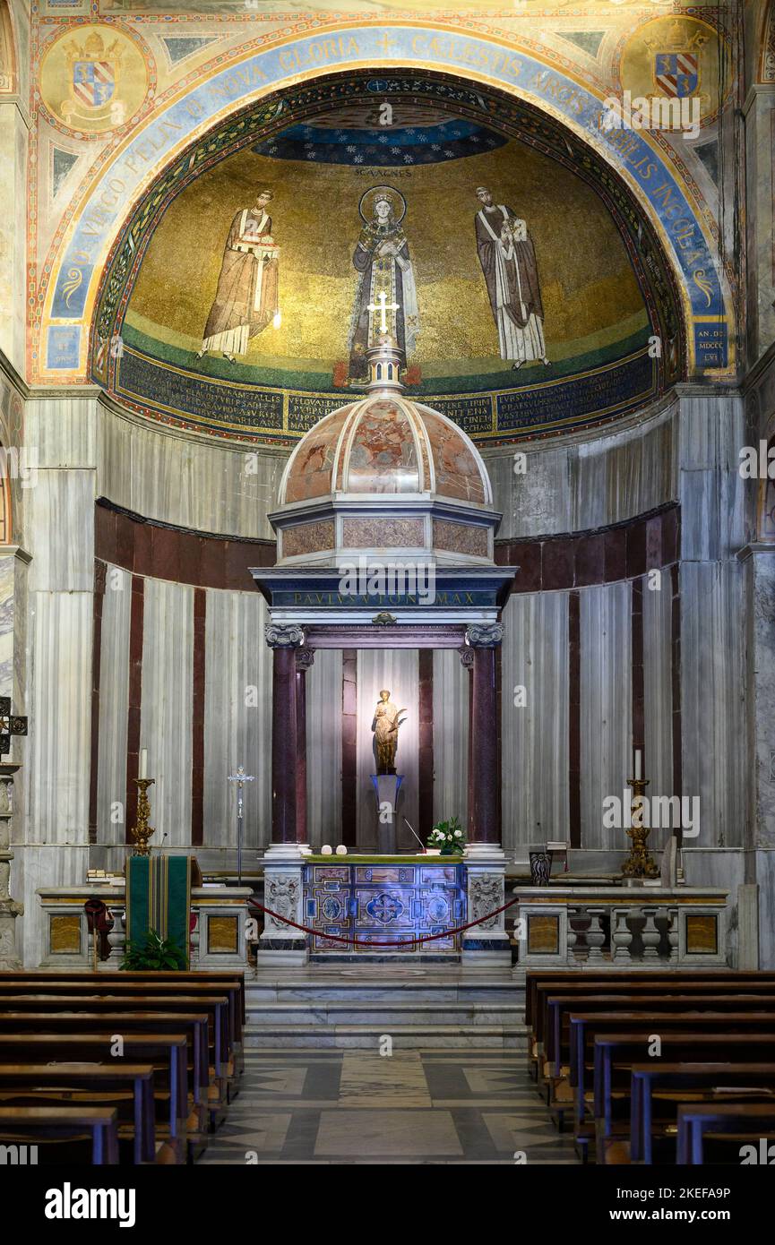 Rome. Italy. Interior of the church of Sant'Agnese Fuori le Mura (Saint Agnes Outside the Walls).  The baldacchino over the high altar dates from 1614 Stock Photo