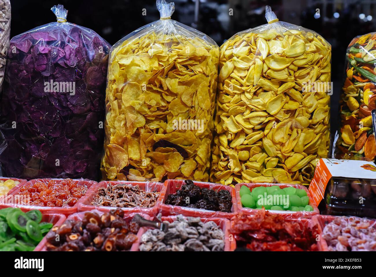 Many dried fruits and berries in night market of street food in Da Lat
