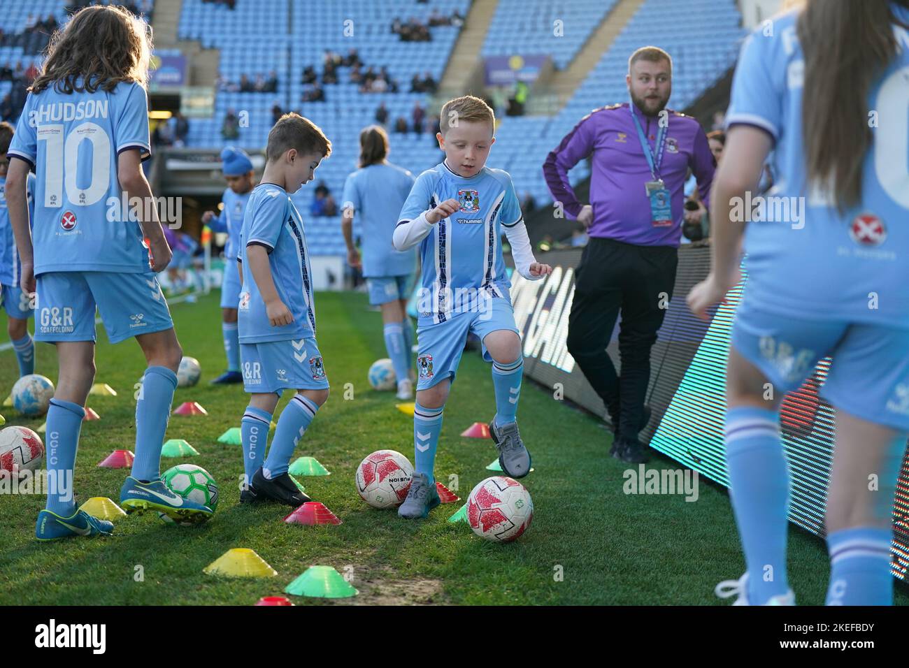 Coventry City match day mascots warm up on the pitch ahead of the Sky