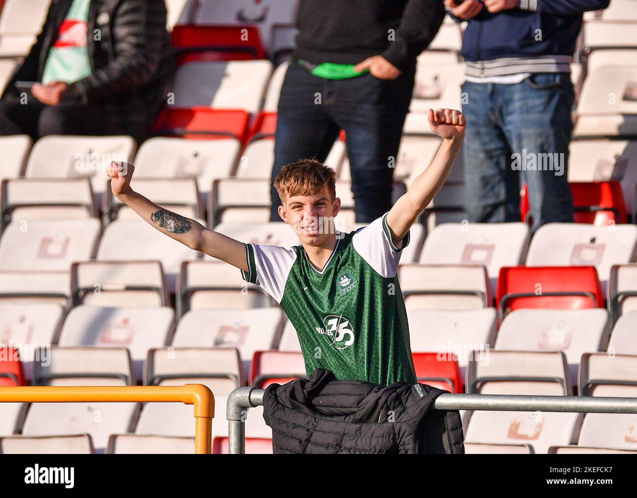 Plymouth Argyle Fans  during the Sky Bet League 1 match Lincoln City vs Plymouth Argyle at Gelder Group Sincil Bank Stadium, Lincoln, United Kingdom, 12th November 2022  (Photo by Stanley Kasala/News Images) Stock Photo