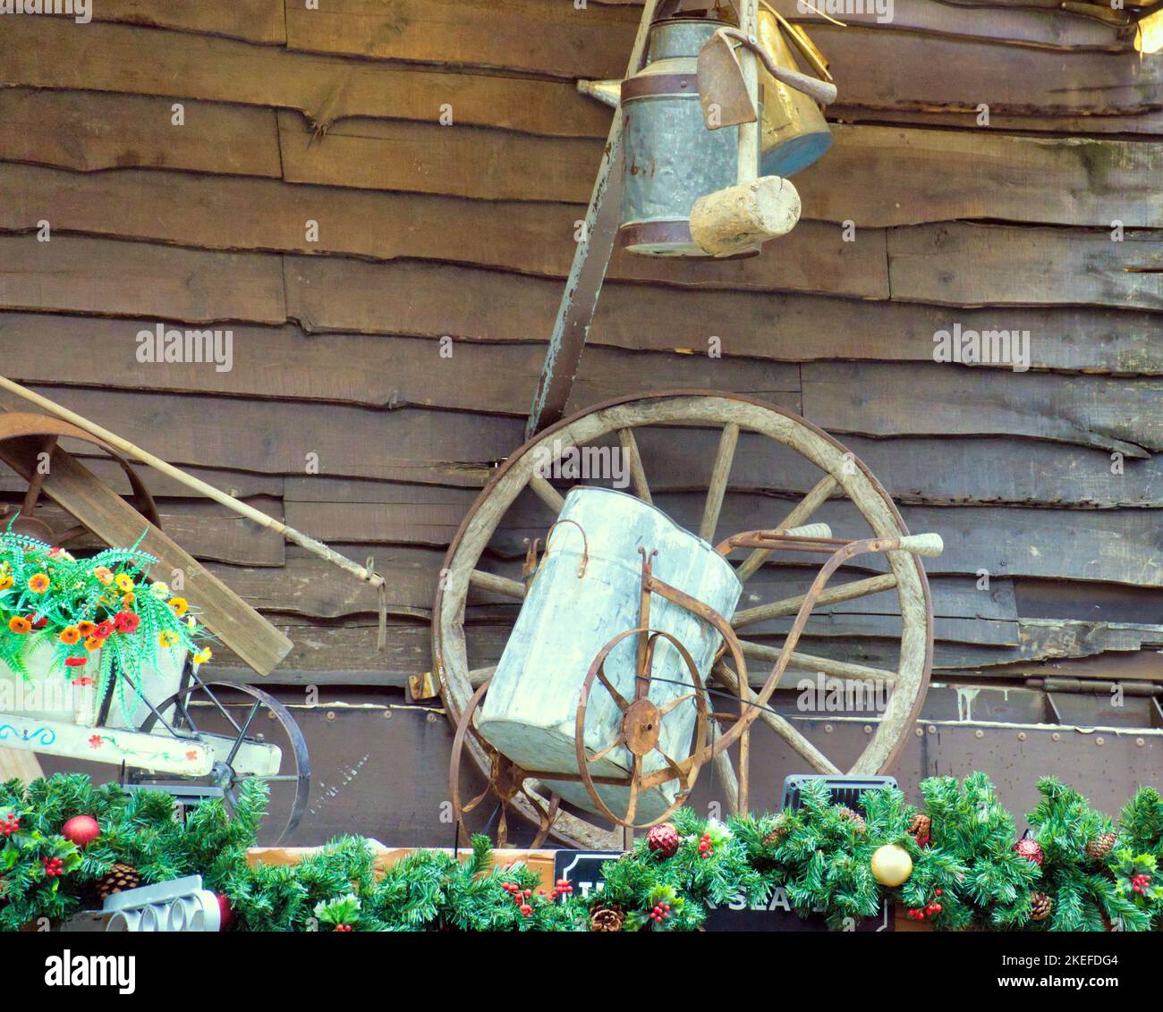 decorative rustic cowboy ranch frontage cartwheel and cart Stock Photo