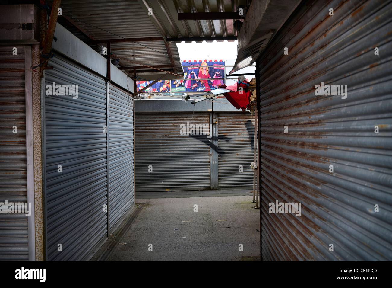 Shuttered stalls in the now closed down Bonny Street outdoor market in Blackpool that is making way for a £300 million leisure development Stock Photo