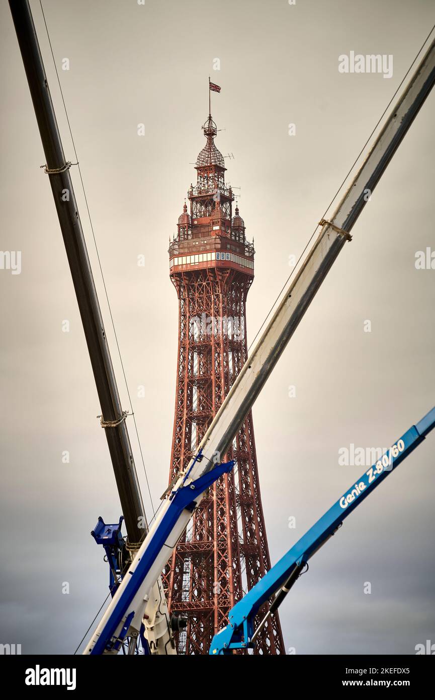 Large construction cranes infront of Blackpool Tower on the site of the £300 million redevelopment Stock Photo