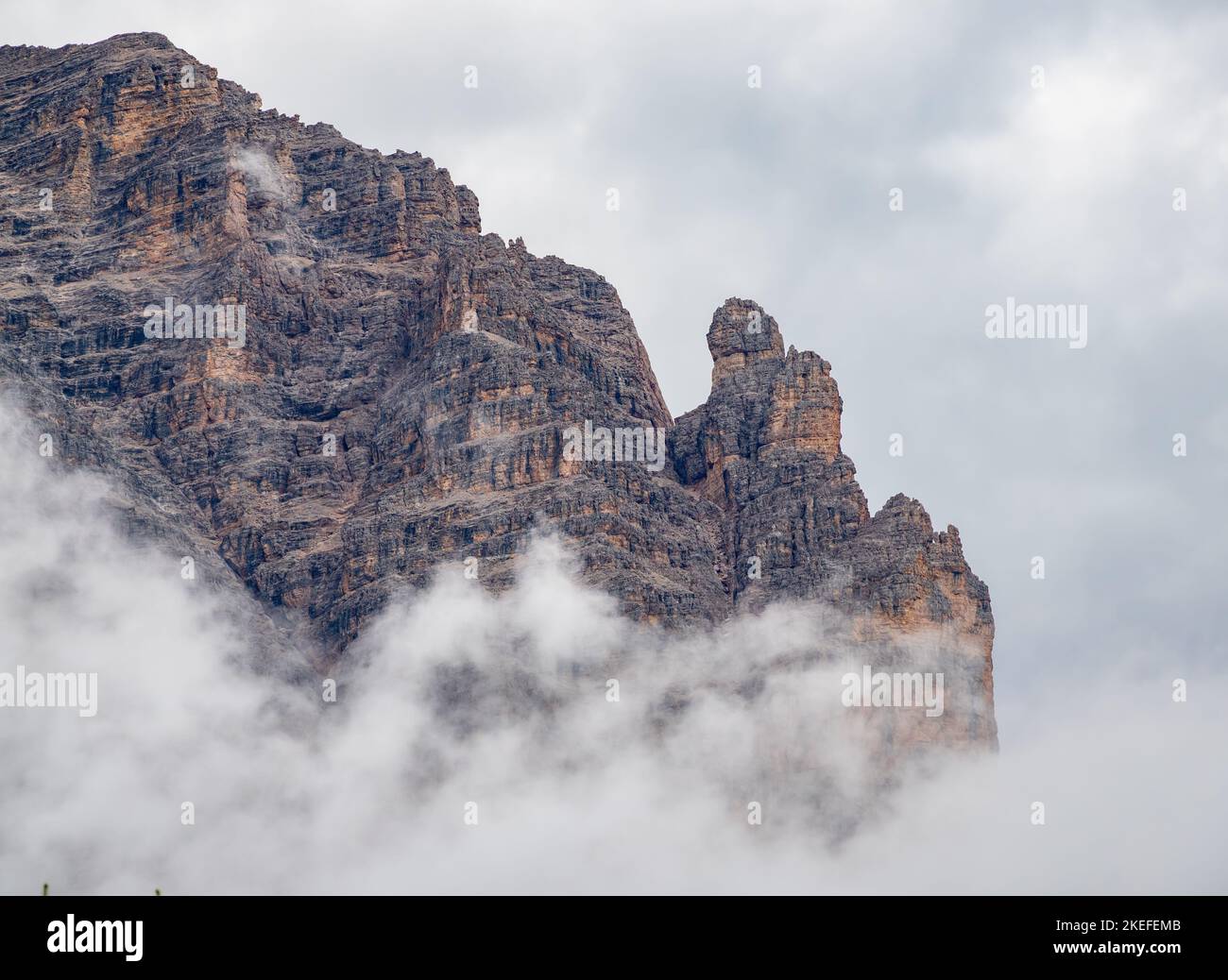A dramatic cloudy scene in Dolomite mountains in Italy Stock Photo