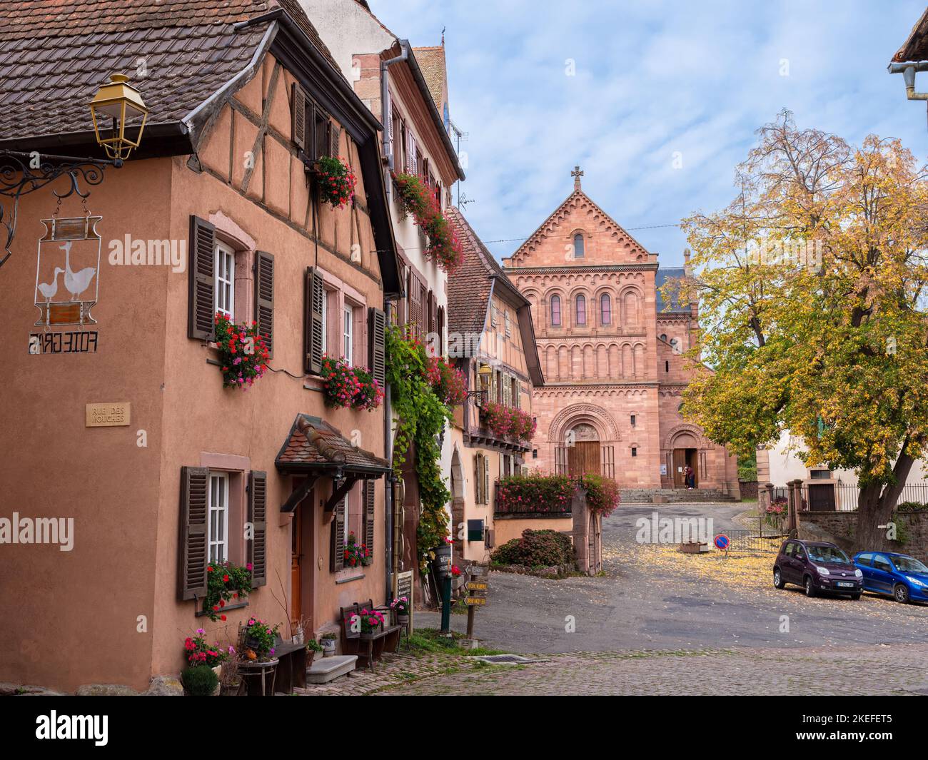 Gueberschwihr, France - October 11, 2022: Village of Gueberschwihr in Alsace with the view at a neo-romanesque church of Saint Panthaleon. Stock Photo