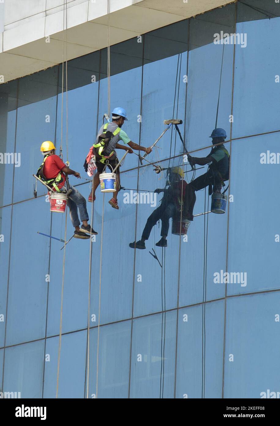 Guwahati, Guwahati, India. 12th Nov, 2022. Workers cleaning the glasses