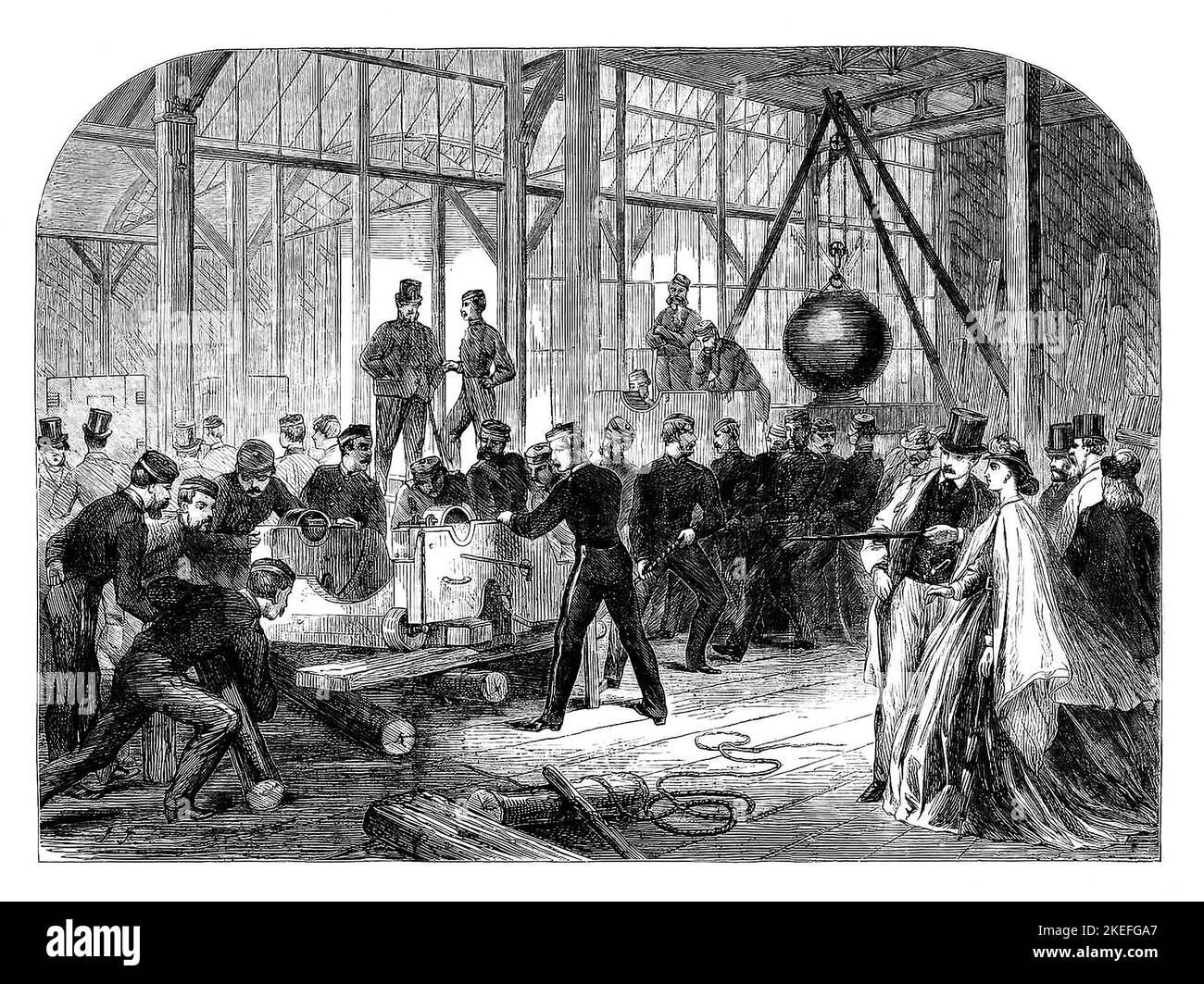 At the second Dublin International Exhibition held in what became Iveagh Gardens during the Irish summer of 1865, soldiers place the Armstrong gun on gun carriages. The rifled breech-loading field and heavy gun was designed by Sir William Armstrong and manufactured in England by the Elswick Ordnance Company and the Royal Arsenal at Woolwich. Stock Photo